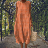 Kira | Elegant sleeveless dress with pockets